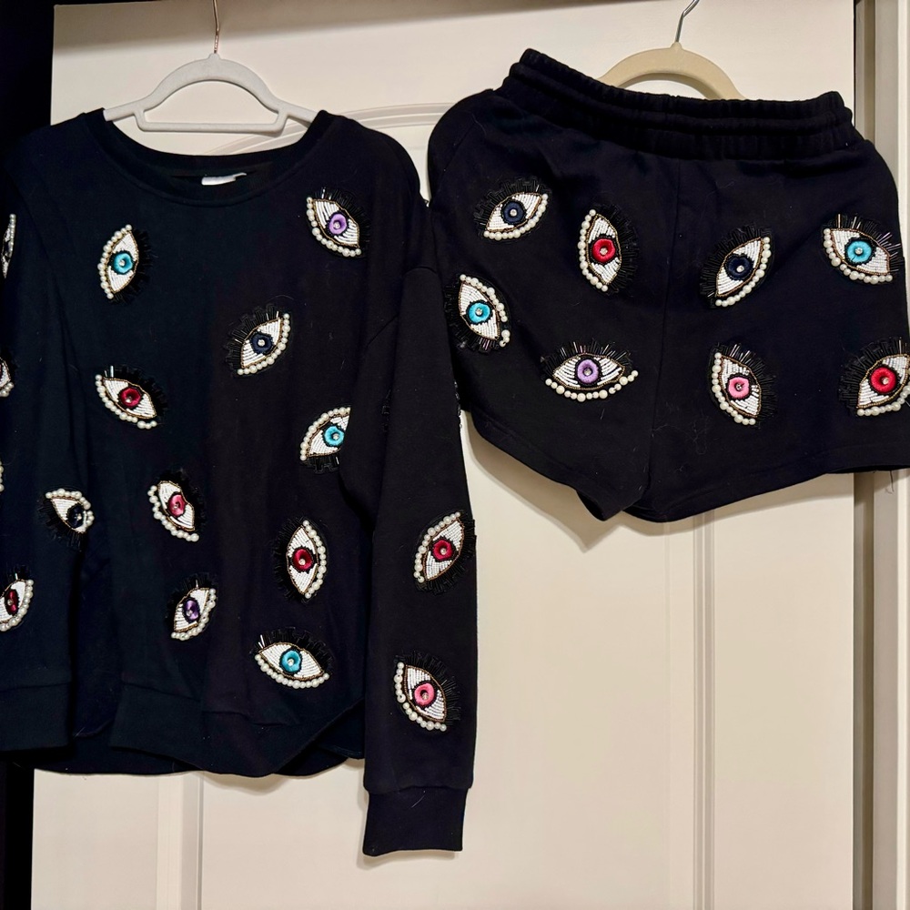 Queen of Sparkles Black Sweater with Colorful Eye Design